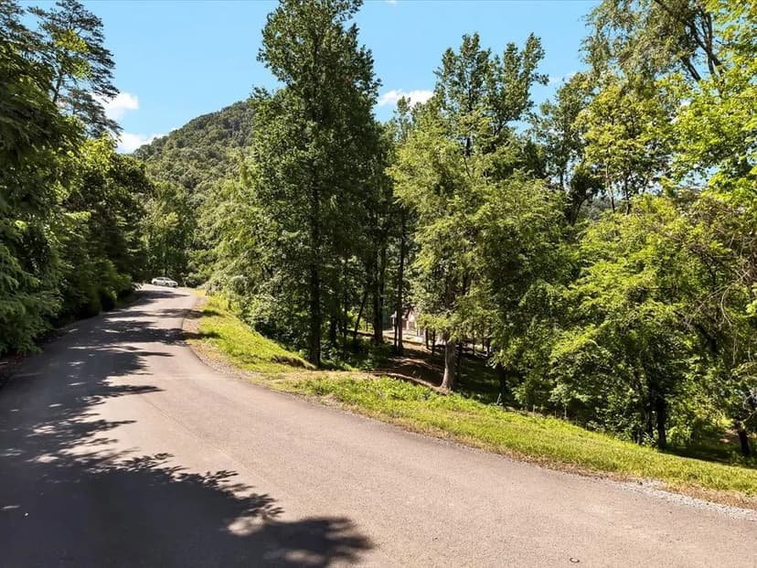 Cherokee Lakefront Lot with Dock, Mountain Views & Gated Access