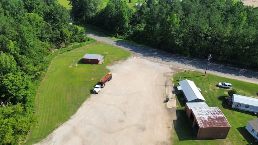 Price Reduced!  Bring us an Offer!  Motivated Seller!  Commercial Building and -/+ 4.5 acres - Carrollton Alabama