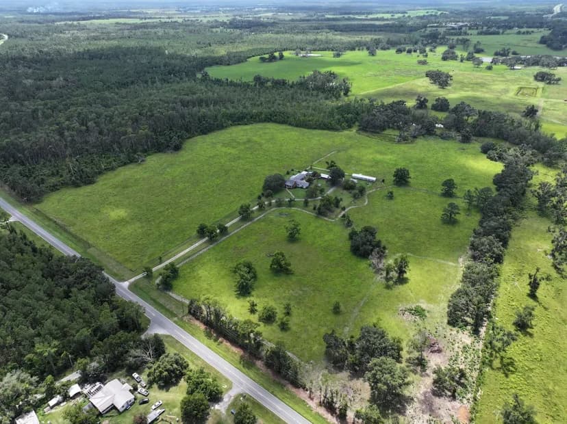 Expansive 50.5-Acre Estate with 4-Bedroom Home & Agricultural Potiental