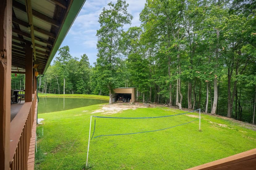 16.20 AC RANCH with 2 site-built homes and being sold together. CUSTOM BUILT HOMES WITH OUTBUILDINGS, POND , CREEK  & A POLE BARN.