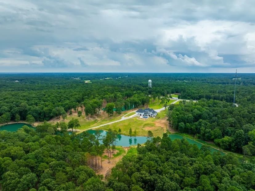 Exquisite 12,000 Sq Ft Luxury Home on 36 +/- Acres with Pool, Theater & Indoor Court,Paragould, AR