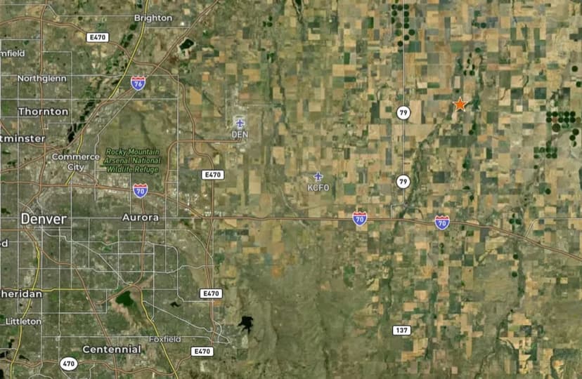 Level Potential Building Lot with Paved Road Frontage & Mountain Views