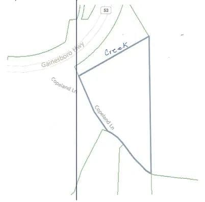 5.32 AC LEVEL OPEN PASTURE – OPEN HAY BARN – SHED  