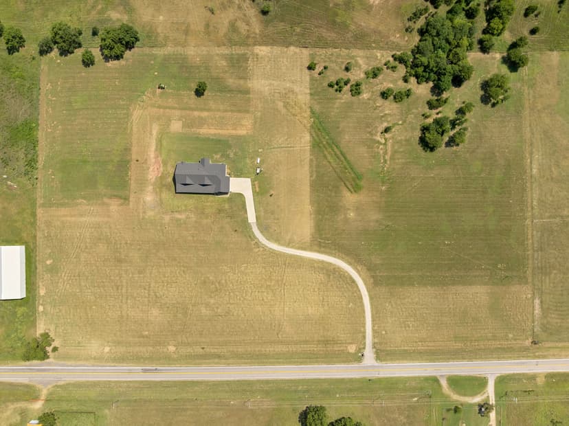 Spanning 3,635 sq ft on 15 acres, this stunning 3-bedroom, 3.5-bath home offers a functional split floorplan with every bedroom featuring its own en-suite bath. The master suite includes a co