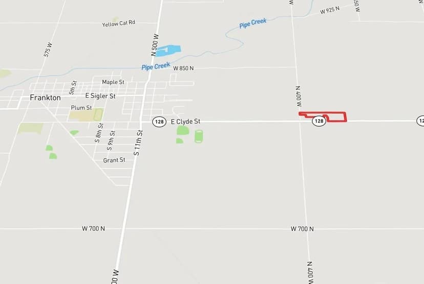 9+/- Acres – Your Dream Renovation Awaits!