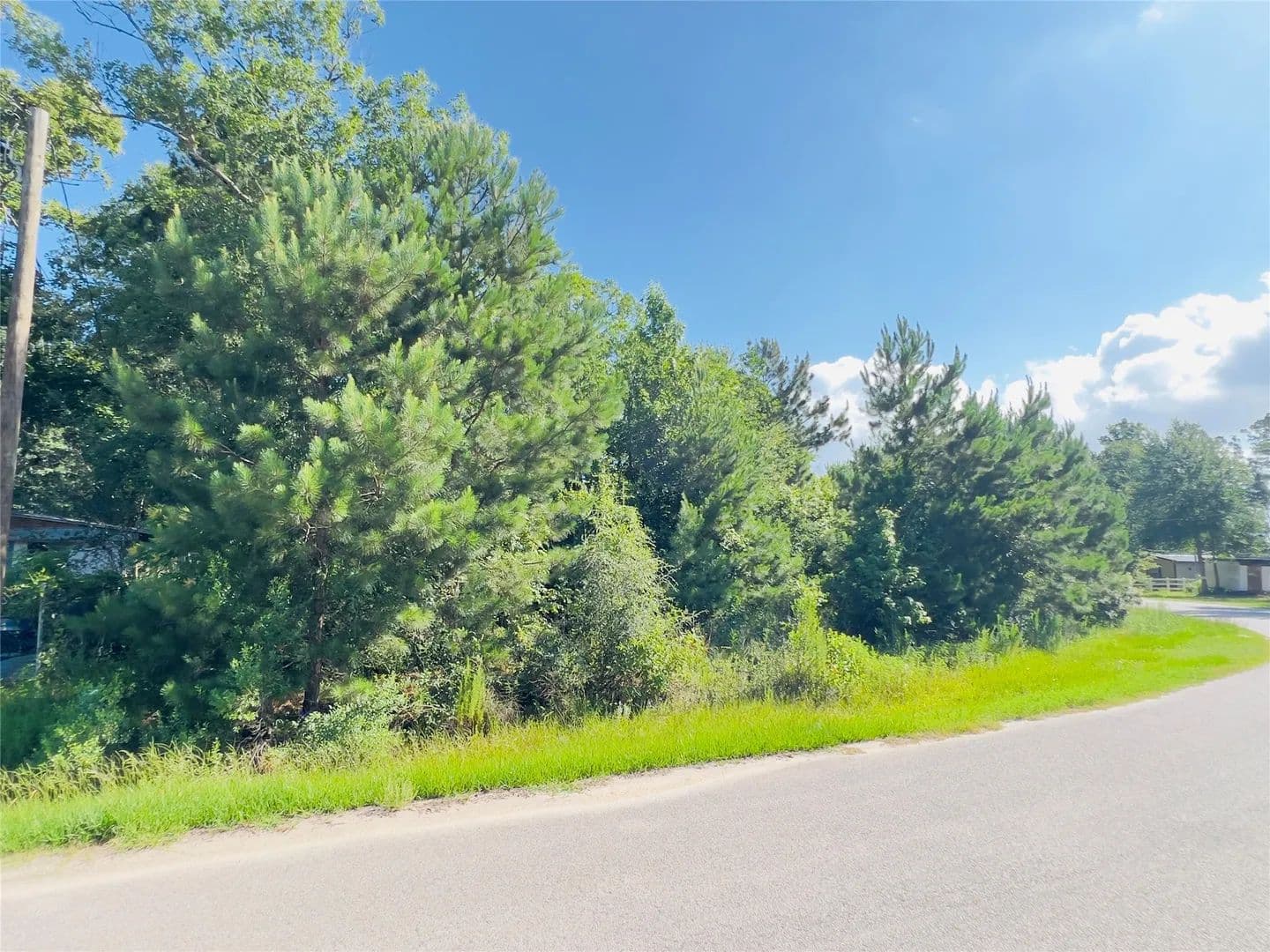 Property from 971 County Road 3415 - KW - Cleveland, Texas, 77327