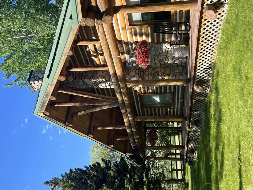 Custom Built Log Home with Detached Studio Suite