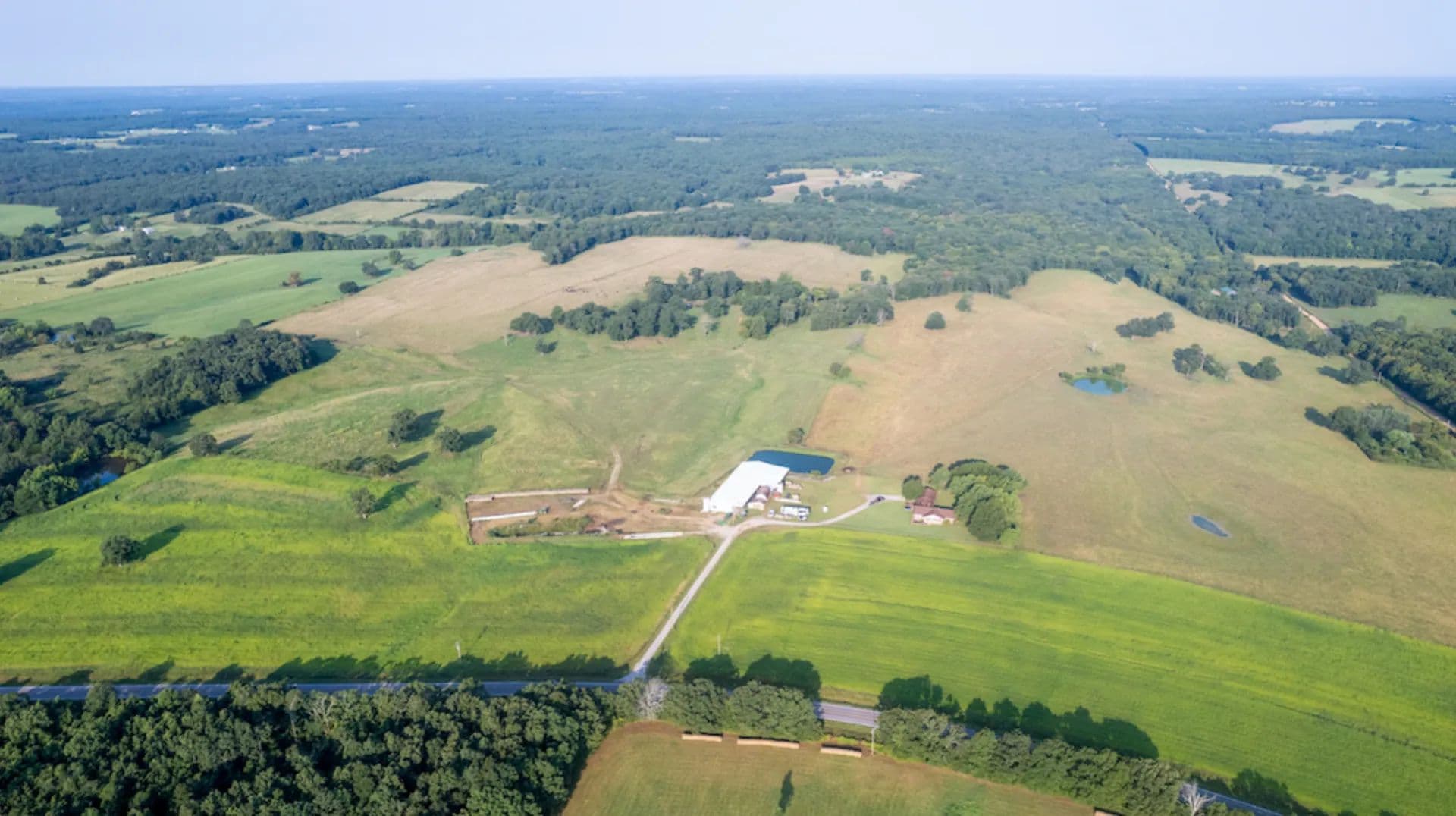 257 +/- Acre Cattle Farm With Home, Covered Cattle Working Facilities And HWY 5 Frontage In Wright County, Missouri - Hartville, Missouri, 65667