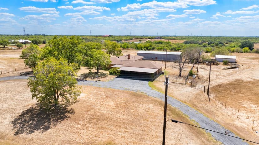 Unique Opportunity — 48 Acres with Home, Barn, Airplane Hangar, and Highway Frontage