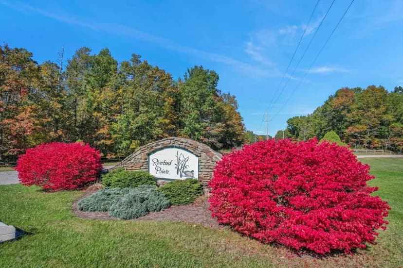 Vaughan Trail Lot #48 is a Home Site in Riverbend Pointe, Oscoda MI 48750