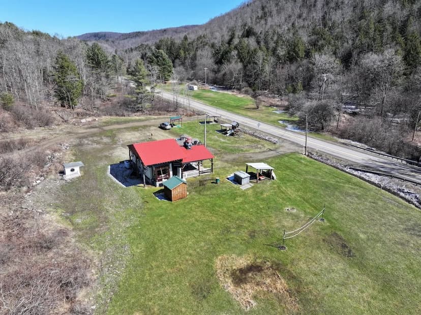 1.7 acres Camper with Multiple RV Hook Ups including All Utilities in Alma NY County Road 18