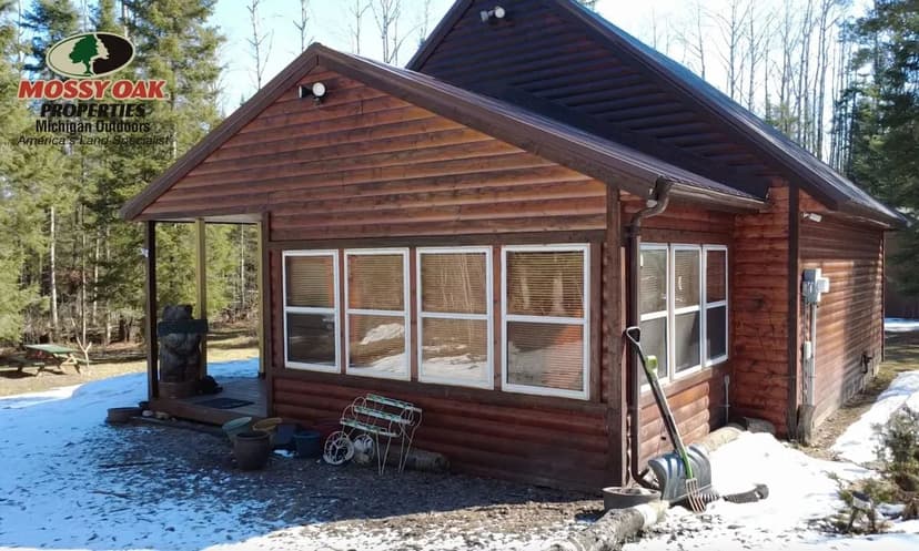 20 Acres of Prime Hunting Land w/ Log Cabin, Private Lake Access & Turnkey Setup – Lachine, MI Near Fletcher’s Pond