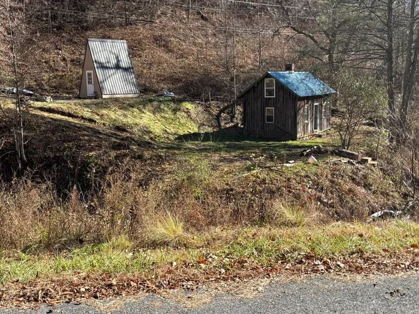 45+/- UNRESTRICTED acres with stunning views and an old homestead!