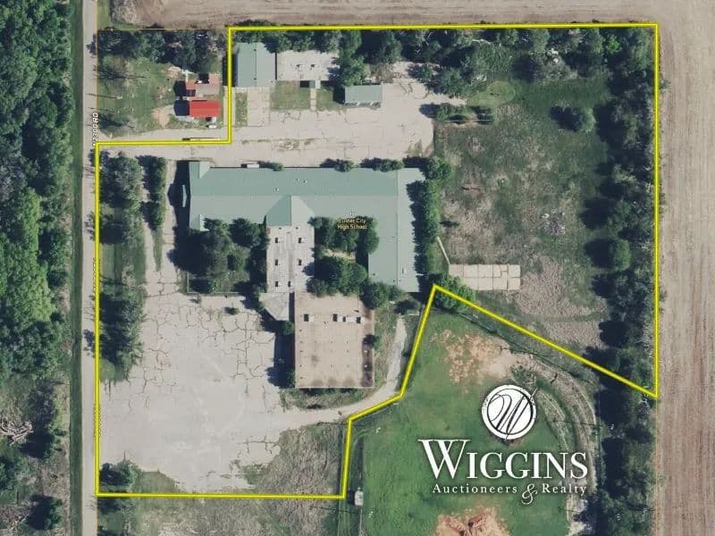 12/4 46,810± Sq. Ft. Commercial Building & Outbldgs on 8.63± Acres 