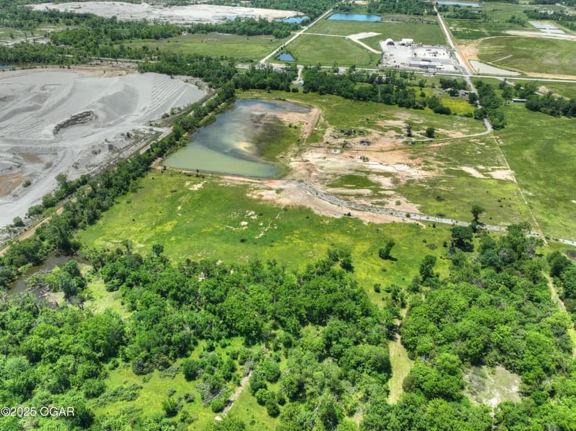 Property from 12001 SE Hwy 69 - KW