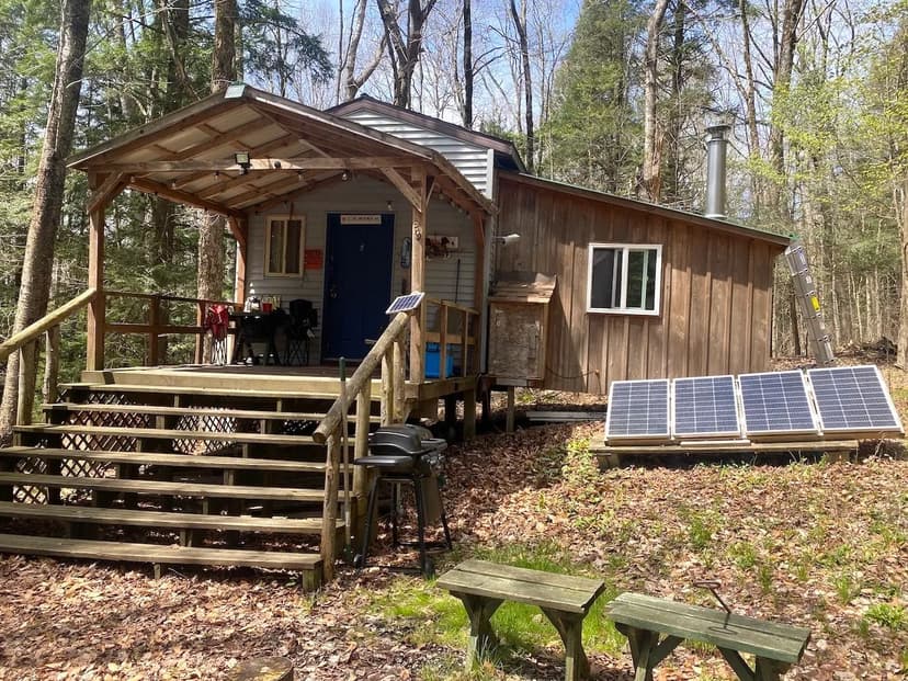 Off Grid Cabin with Solar Panels on 8 acres near State Land in Grove NY County Road 16