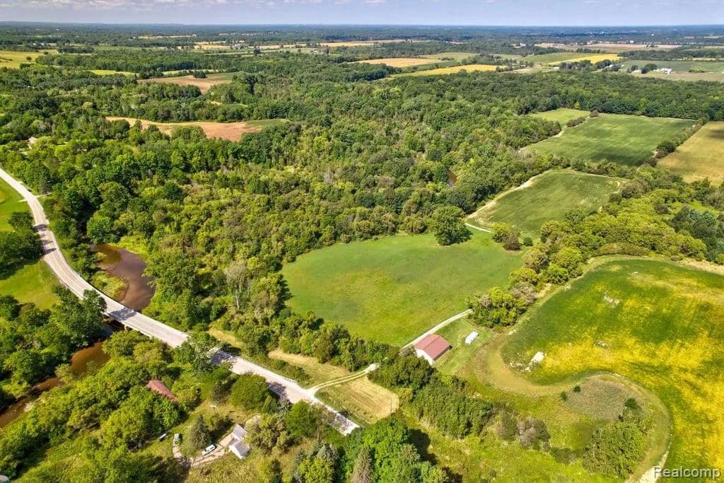 63.77 Acres of Land for Sale in Brockway Township, MI - Michigan, 48097