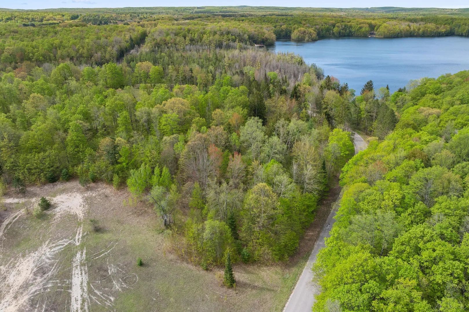 Property from Lot 44 Lake Of The Woods Road - KW - Bellaire, Michigan, 49615