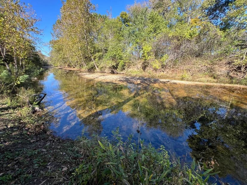 9.04 Acres Riverfront Retreat on the Little Niangua River!