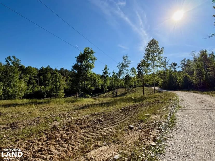 Walnut Creek Fishing and Recreational Tract with Lake, Camp and Creekfront