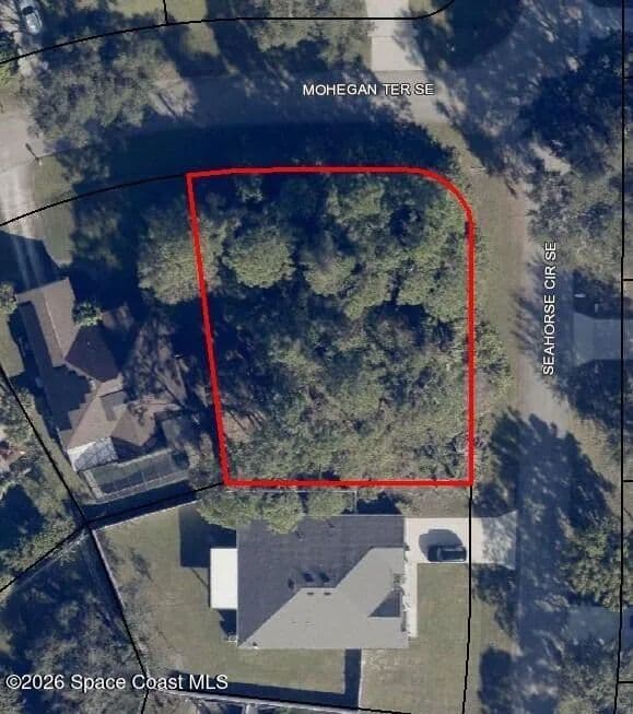 Property from 1301 Mohegan (Corner Seahorse) Terrace SE - KW - Palm Bay, Florida, 32909
