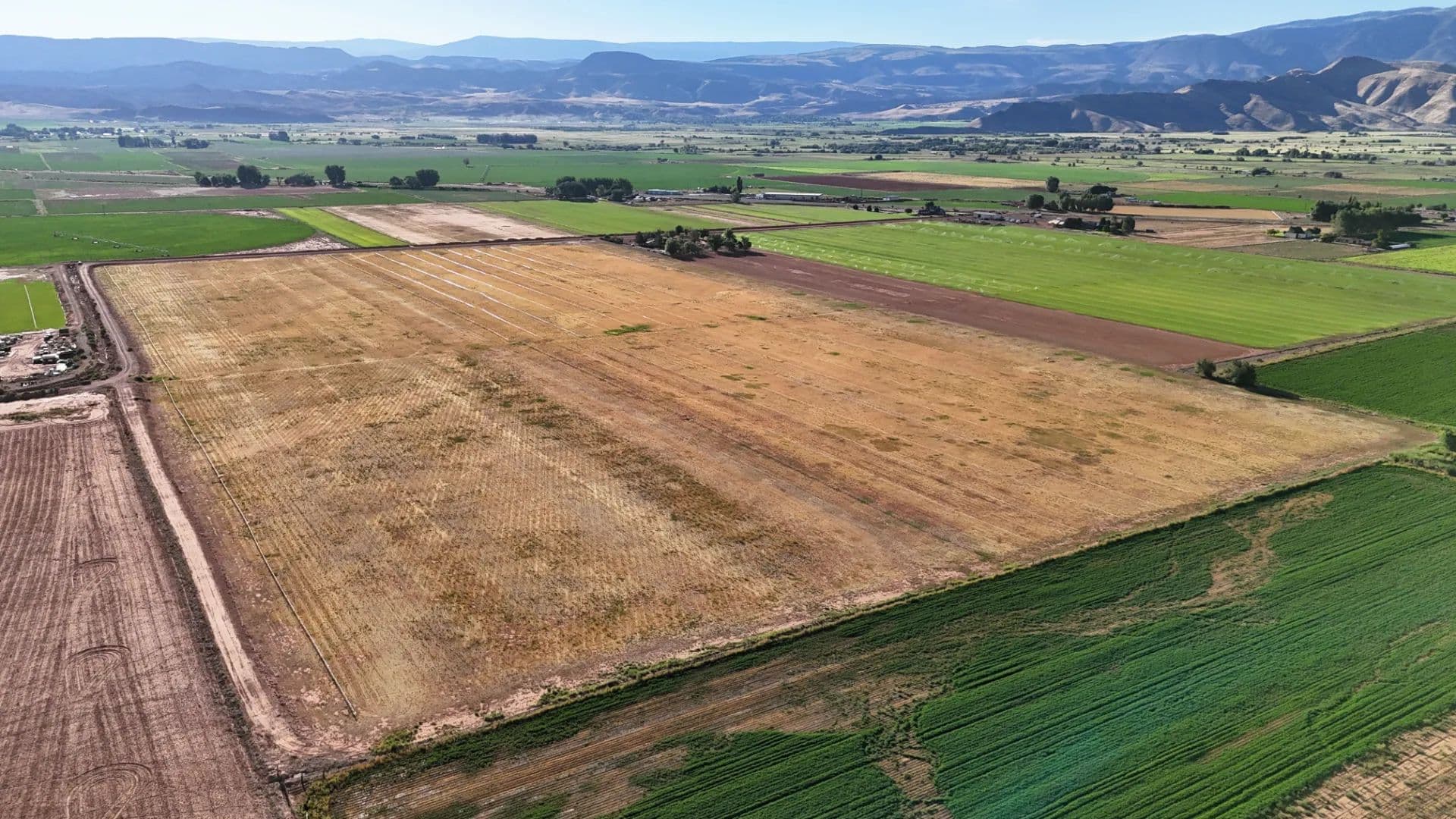 30 flat, irrigated acres near Richfield with 30 shares of canal water, red rock and farmland views, and private road access. - Richfield, Utah, 84701