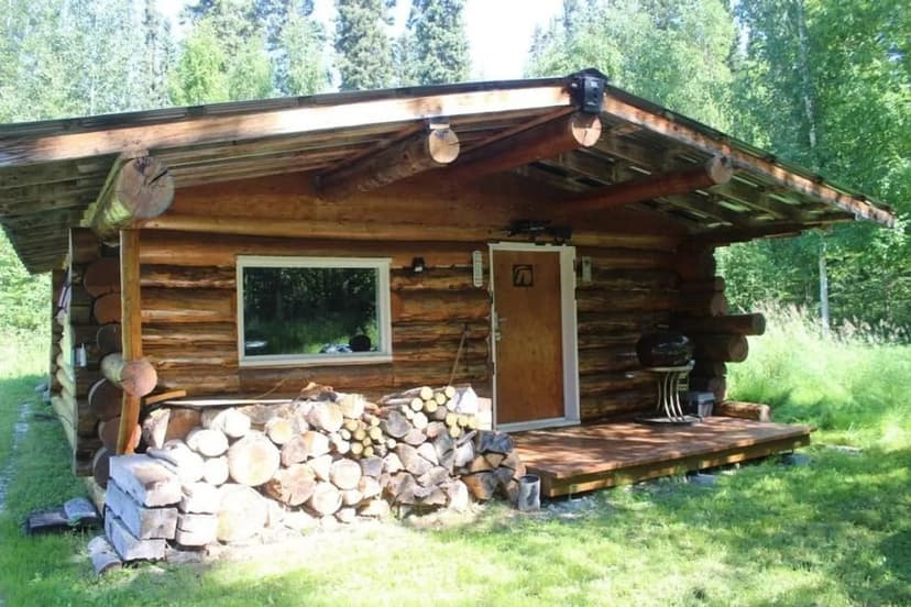 Remote Teklanika Riverfront Property: Two Log Cabins on 4 Acres of Alaskan Wilderness — Ideal for Hunters!