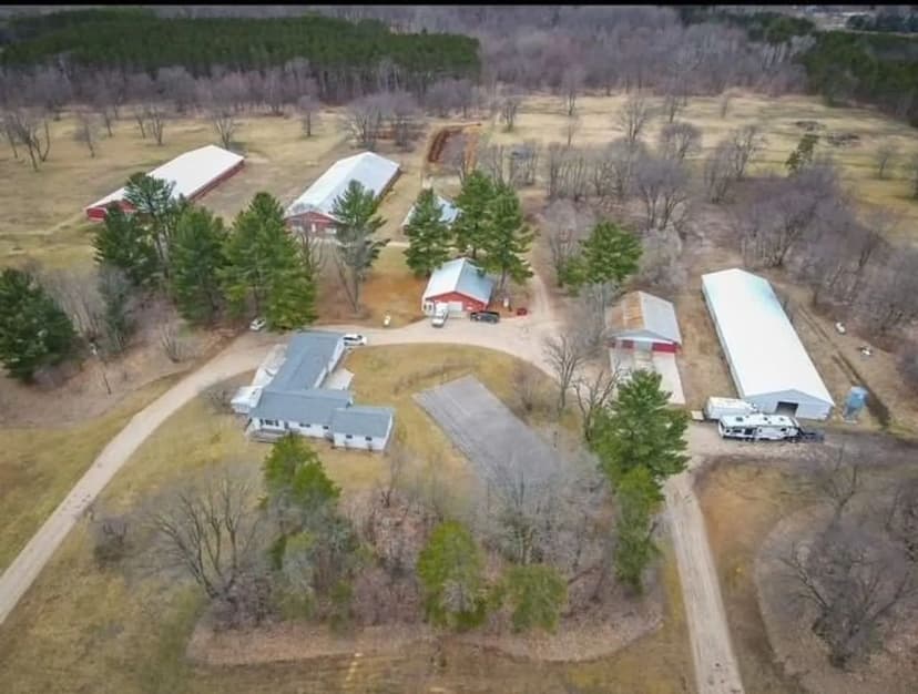 44 acres, 4 bed 2 bath home, 40,000 sq ft storage space (6 pole barns)