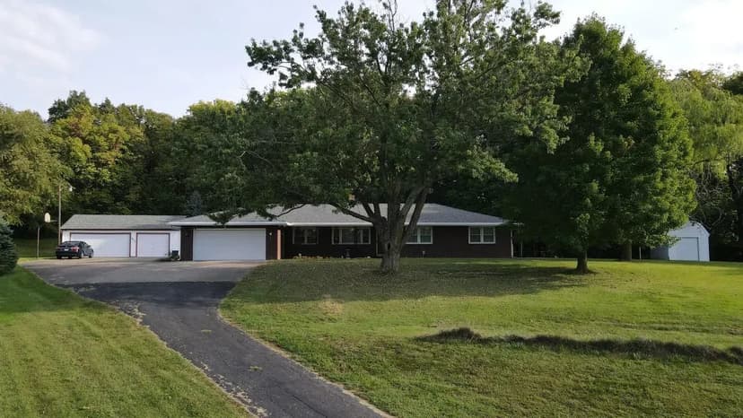 Beautiful Brick Home on 19 Acres in Buchanan County!