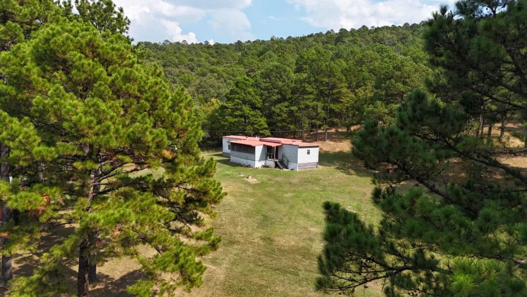40 Acres with Home, Cabin, Pond & Timber – Daisy, OK - land for sale