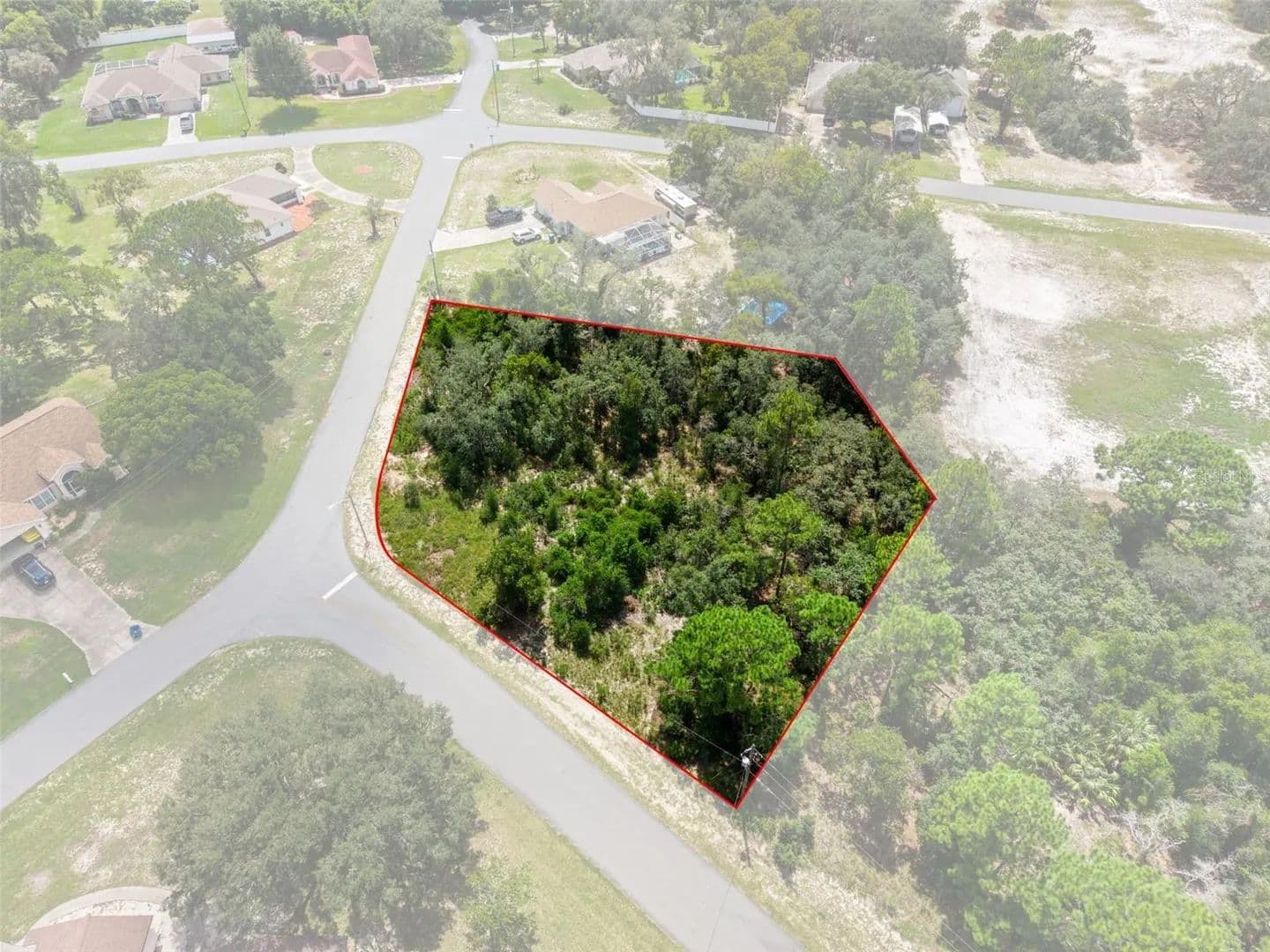 0.79 Acres of Land for Sale in SPRING HILL, FL - land for sale