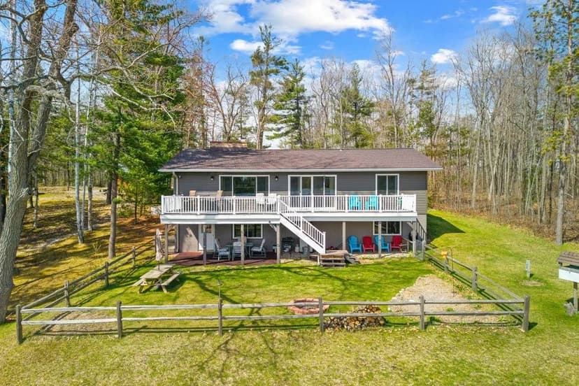 Scenic Lakefront Home in Atlanta, MI for Sale on 8 Acres