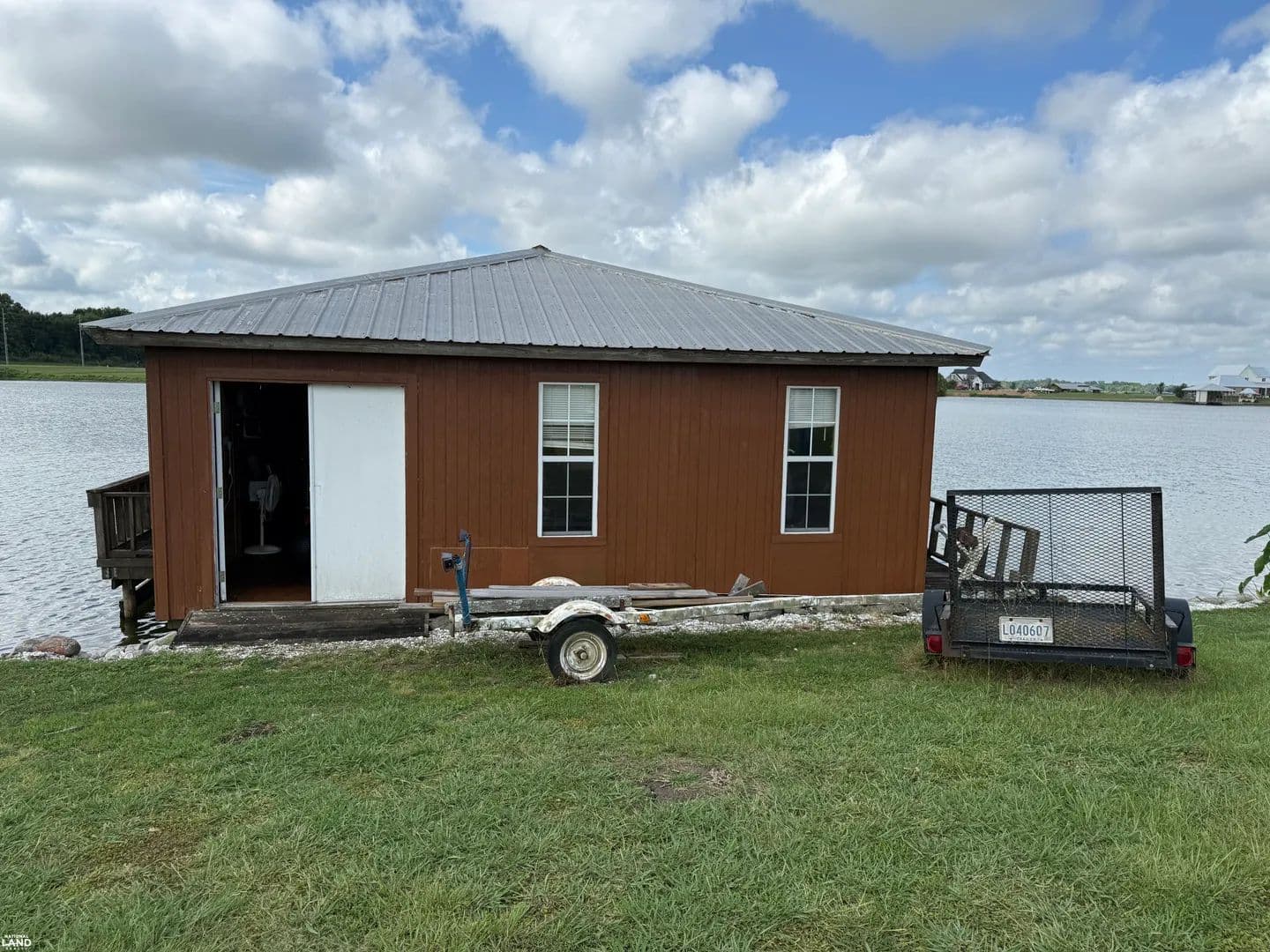 PRICE REDUCED !! Beautiful Lot With Boathouse on Poverty Pt. Lake - Delhi, Louisiana, 71232