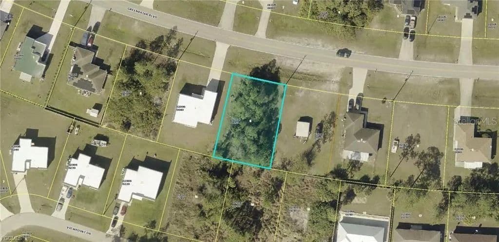 Property from 123 GREENBRIAR BOULEVARD - KW - Lehigh Acres, Florida, 33972