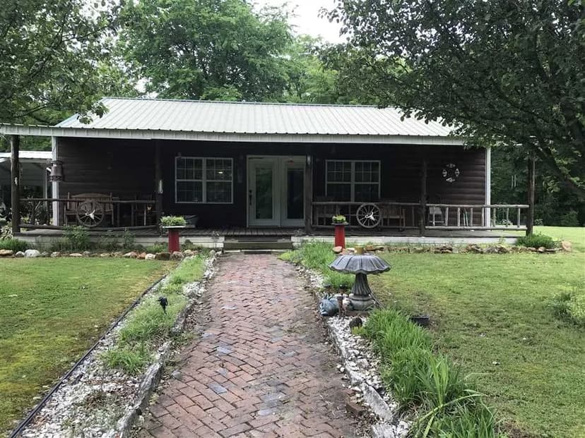 1500 sq ft MOL rustic home built 2008 on 3.5 +/- acres with shop, outbuildings, 2 bedroom 2 bath