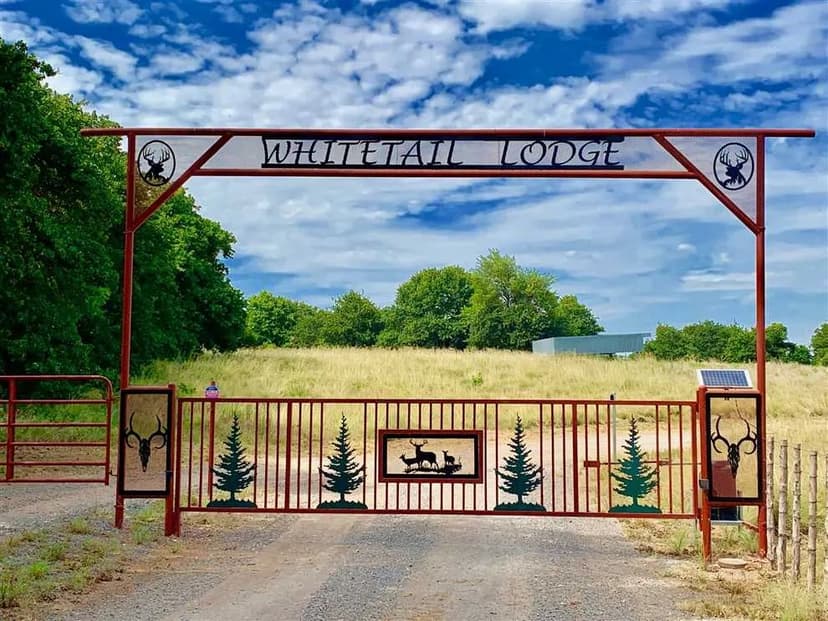 PRICE REDUCTION...Whitetail Lodge 80 Acres w/Barn Home ready to move inJust 1.1 miles off pavement!