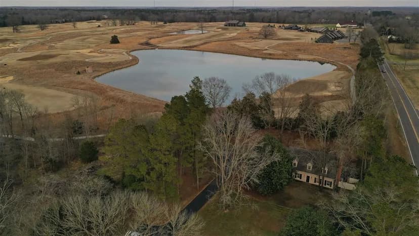 Beautiful and move in ready! This house sits on a spacious 1.23 acre lot with plenty of privacy and has been completely updated. Located adjacent to the new Mossy Oak Golf Club and less than