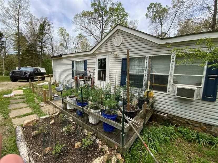Nice 1999 Mobile Home sitting on 6 +/- wooded acres with pond, Izard, County, AR